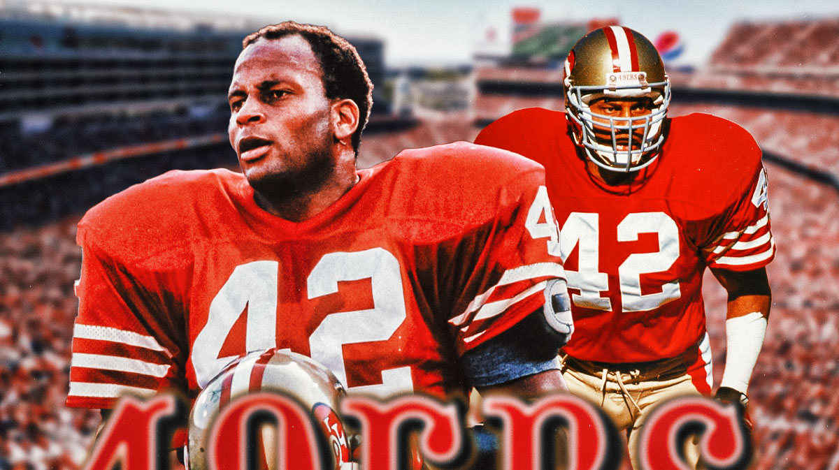 Ronnie Lott in image in San Francisco 49ers jersey, SF 49ers logo, football field in background
