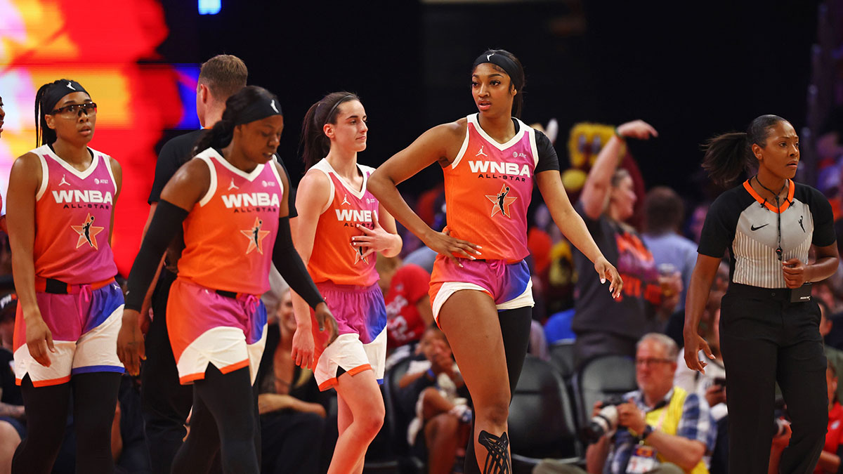 Team WNBA forward Angel Reese (5)and Team WNBA guard Caitlin Clark (22) react after a play during the first half against the USA Women's National Team at Footprint Center.