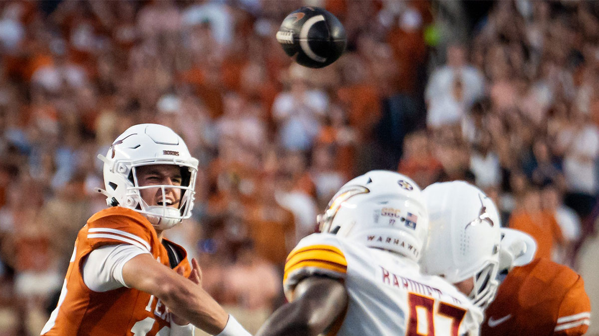 Arch Manning throwing a pass against ULM.