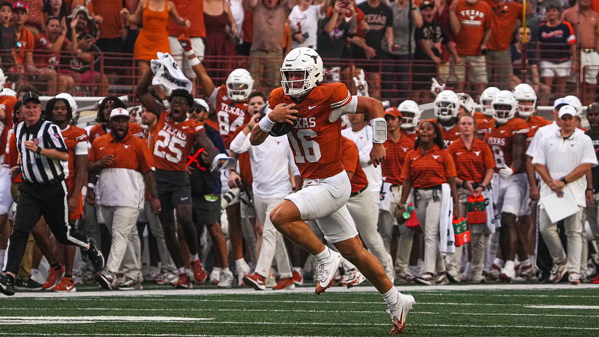 Texas Longhorns quarterback Arch Manning (16) runs the ball during the game against UTSA.