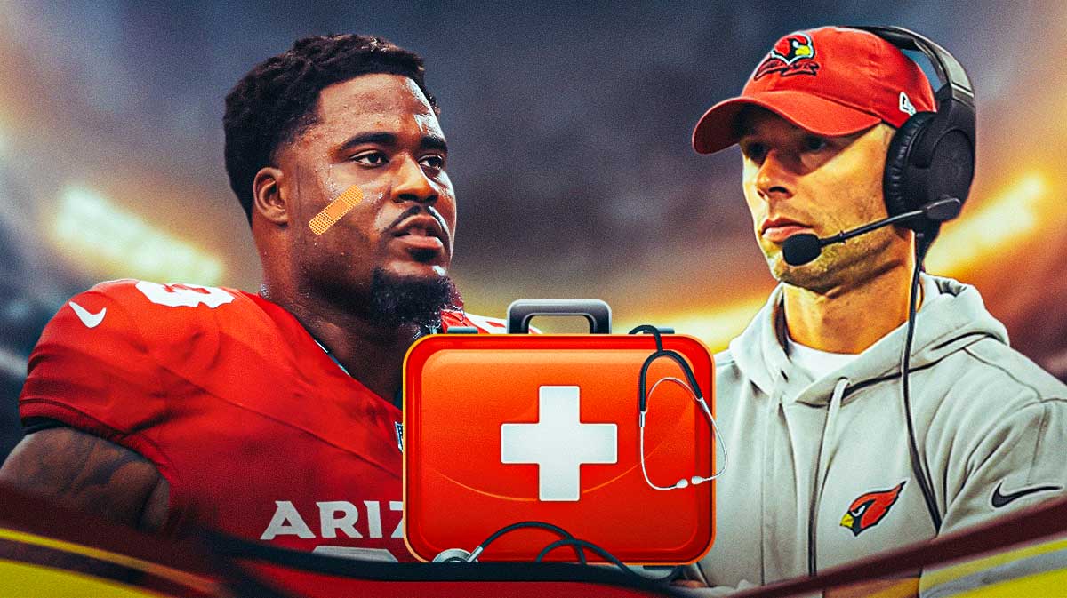 Cardinals DT Justin Jones looking disappointed with band aids and med kits next to him and Cardinals head coach Jonathan Gannon