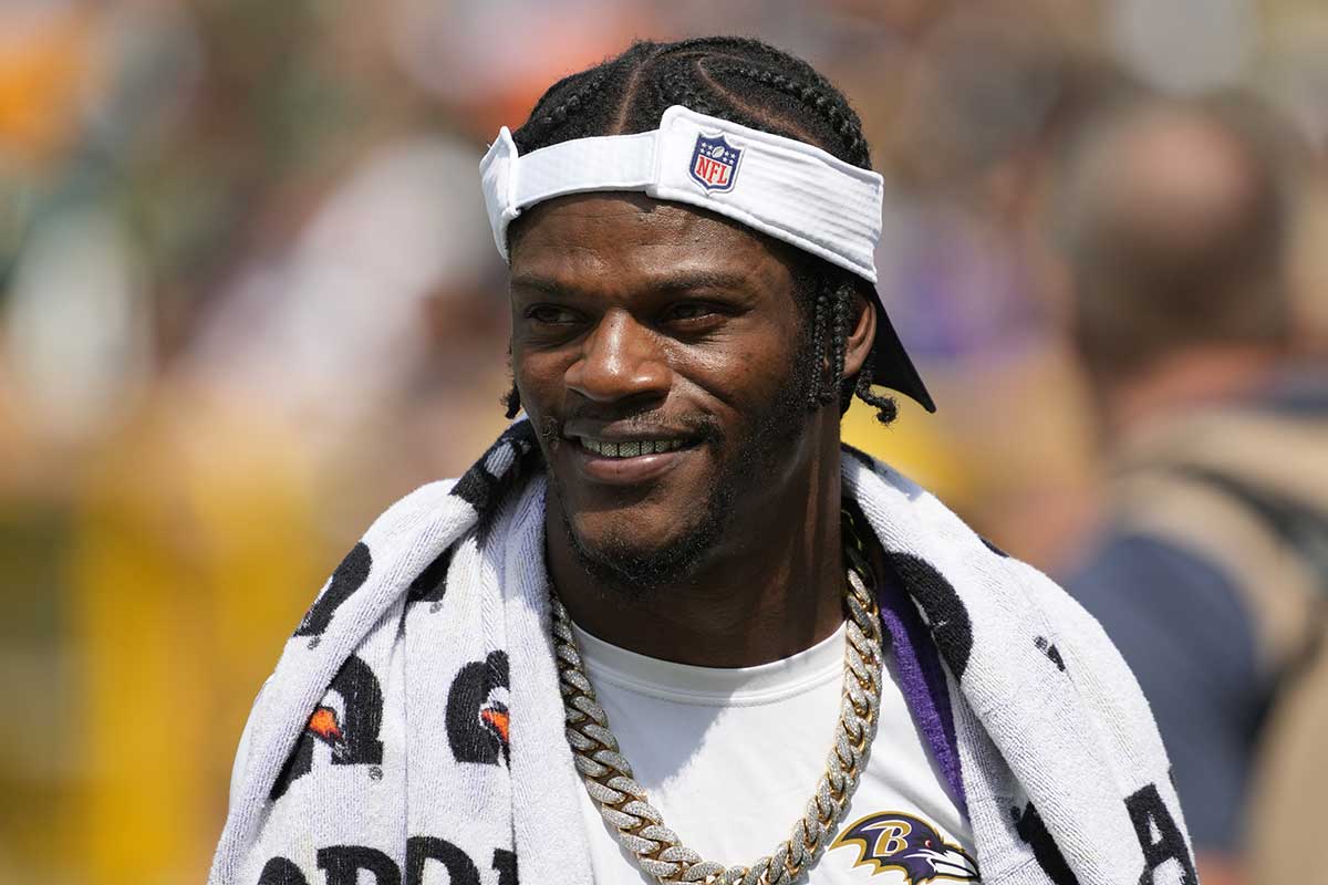 Baltimore Ravens quarterback Lamar Jackson walks to the locker room prior to halftime of the game against the Green Bay Packers at Lambeau Field.