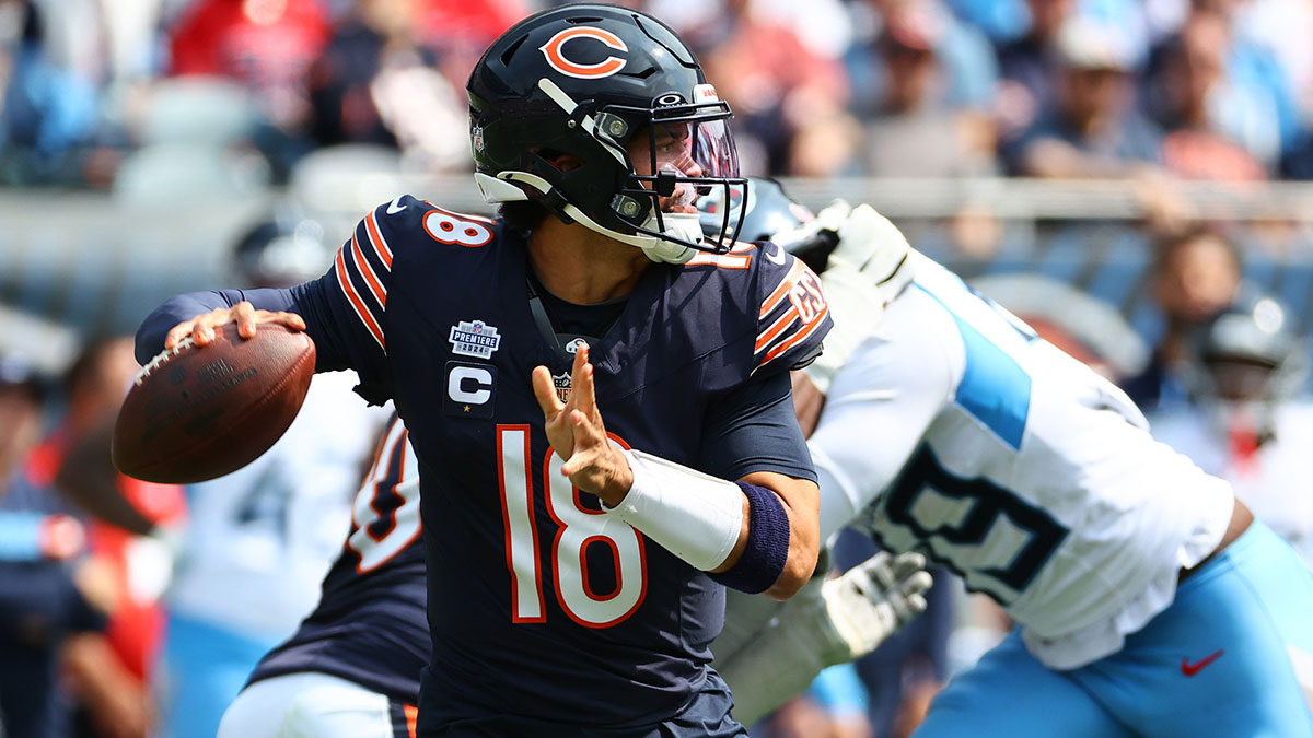 Chicago Bears quarterback Caleb Williams (18) drops back to pass during the second half against the Tennessee Titans at Soldier Field.