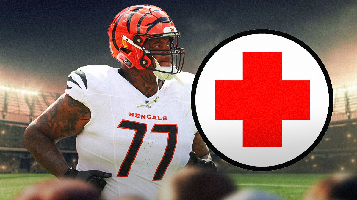 Trent Brown with a medical cross on his chest.