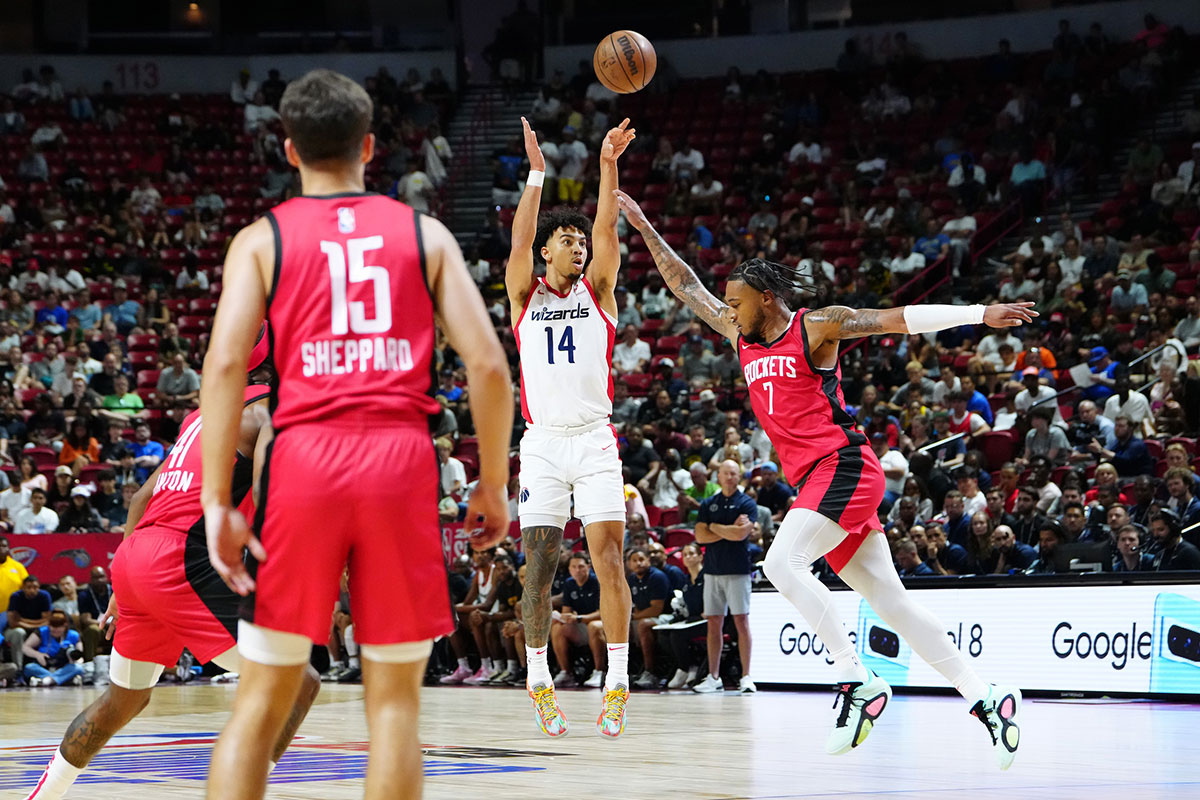 Washington Wizards guard Jules Bernard (14) shoots against Houston Rockets forward Cam Whitmore (7) during the second quarter at Thomas & Mack Center.