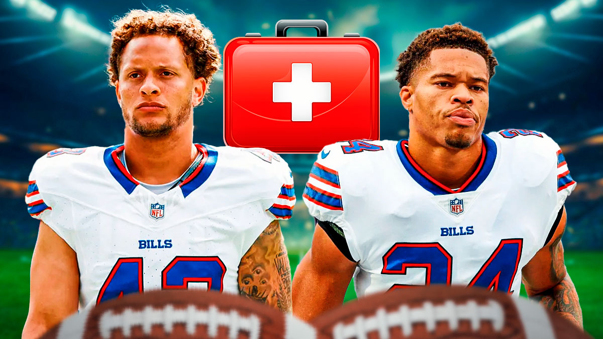 Bills Terrel Bernard and Taron Johnson with a first aid kit between them