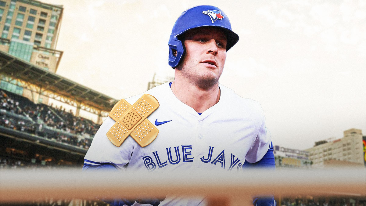 Blue Jays' Daulton Varsho with a bandage on his right shoulder
