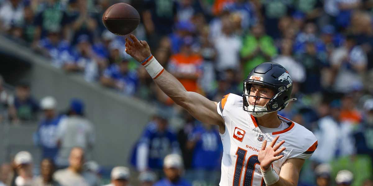 Denver Broncos quarterback Bo Nix (10) passes against the Seattle Seahawks during the second quarter at Lumen Field.