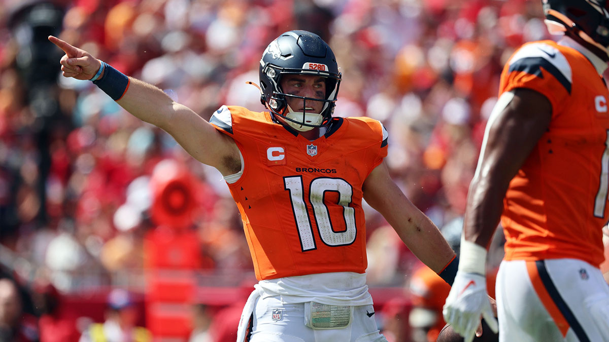Denver Broncos quarterback Bo Nix (10) reacts after he gets first down against the Tampa Bay Buccaneers during the second half at Raymond James Stadium.