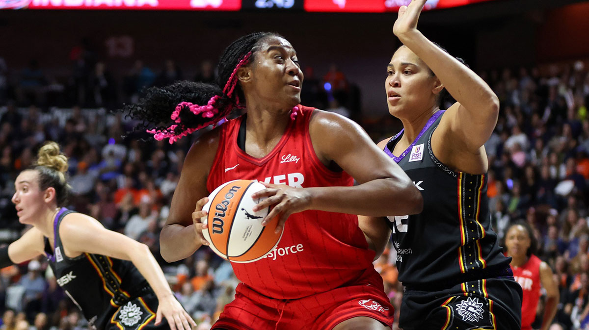 Indiana Fever forward Aliyah Boston (7) drives to the basket during the first half against the Connecticut Sun during game two of the first round of the 2024 WNBA Playoffs at Mohegan Sun Arena.