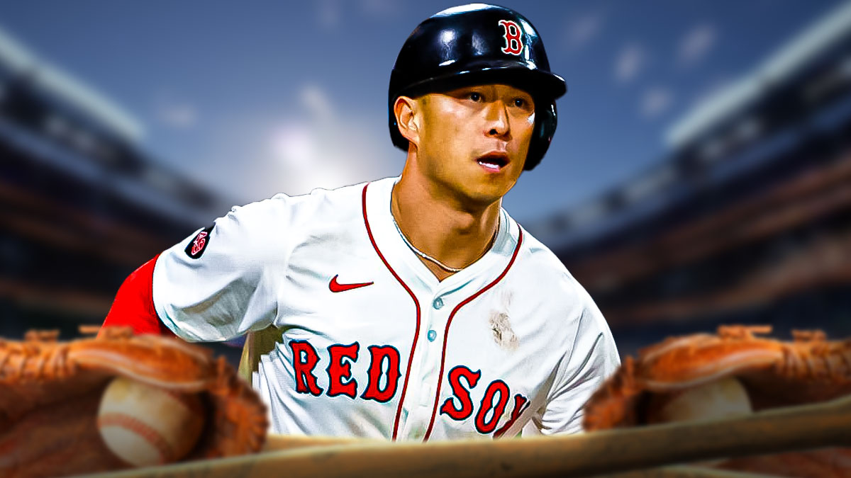 Boston Red Sox star Rob Refsnyder in front of Fenway Park.