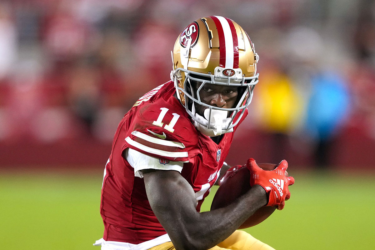 San Francisco 49ers wide receiver Brandon Aiyuk (11) runs after a catch against the New York Jets during the fourth quarter at Levi's Stadium. 