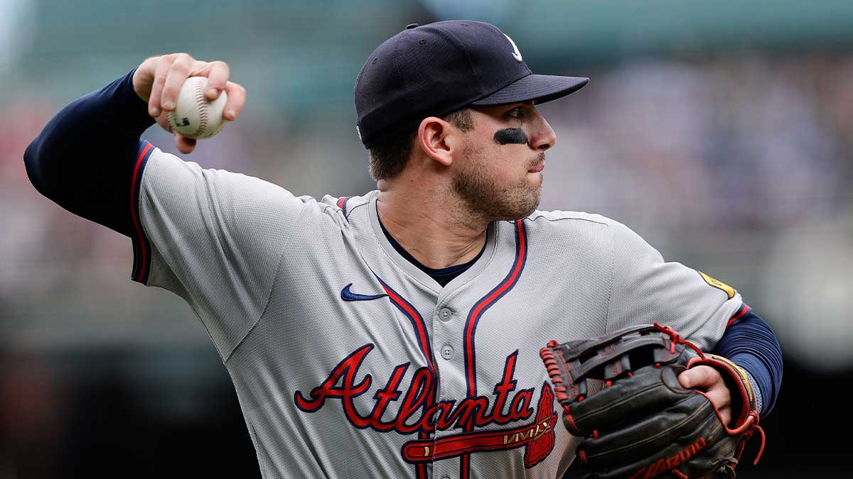 Atlanta Braves third baseman Austin Riley (27) throws to first for an out in the fifth inning against the Colorado Rockies at Coors Field.