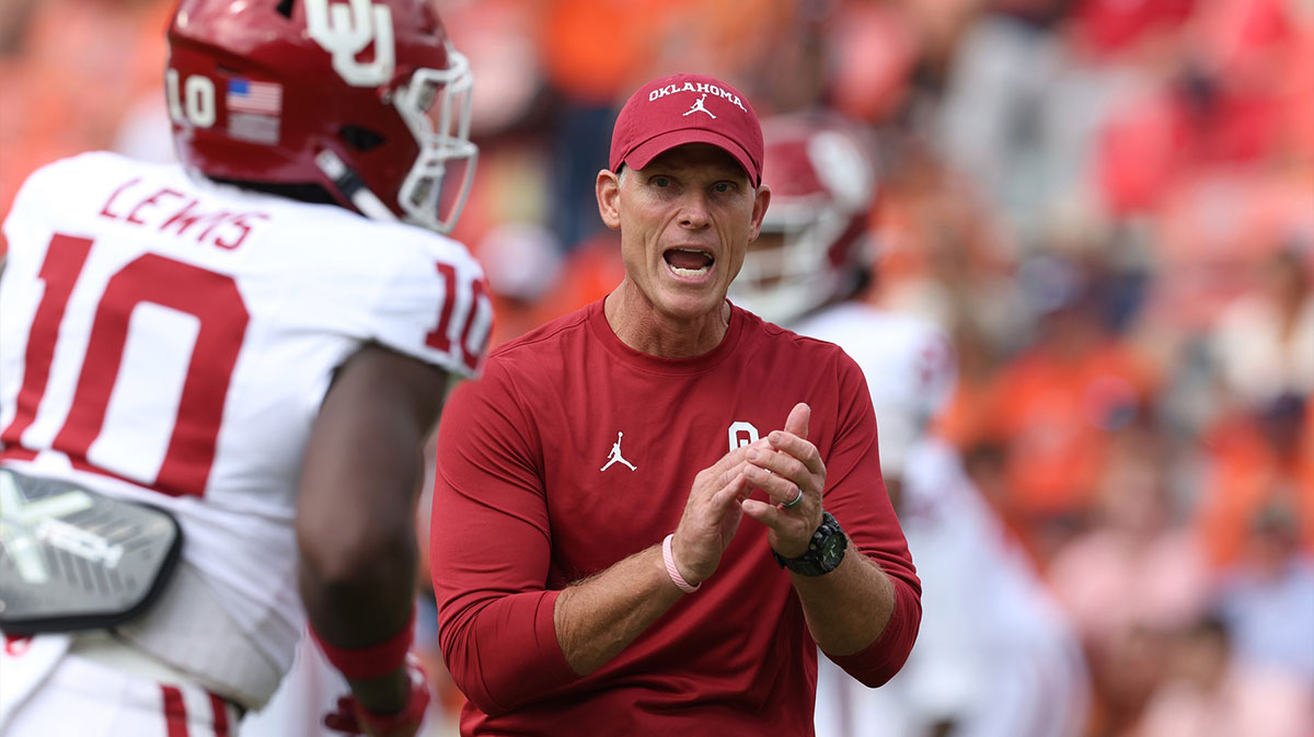 Oklahoma Sooners head coach Brent Venables watches his team warm up before their game against the Auburn Tigers at Jordan-Hare Stadium.