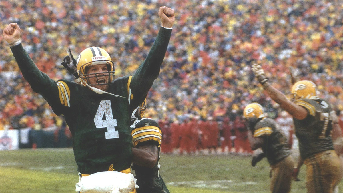 Packers quarterback Brett Favre shows his delight after Edgar Bennett's goal-line fumble was recovered by Antonio Freeman for a touchdown in the third quarter of the January 4 Divisional playoff win against San Francisco. The Packers defeated the 49ers that day, 35-14. January 29, 1997. 1997 Press Photo Packers Quarterback Brett Favre Celebrates Teams Touchdown