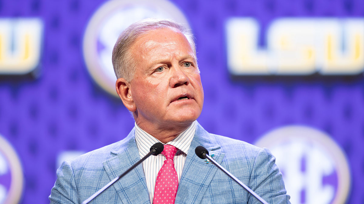 LSU head coach Brian Kelly speaking at Omni Dallas Hotel.