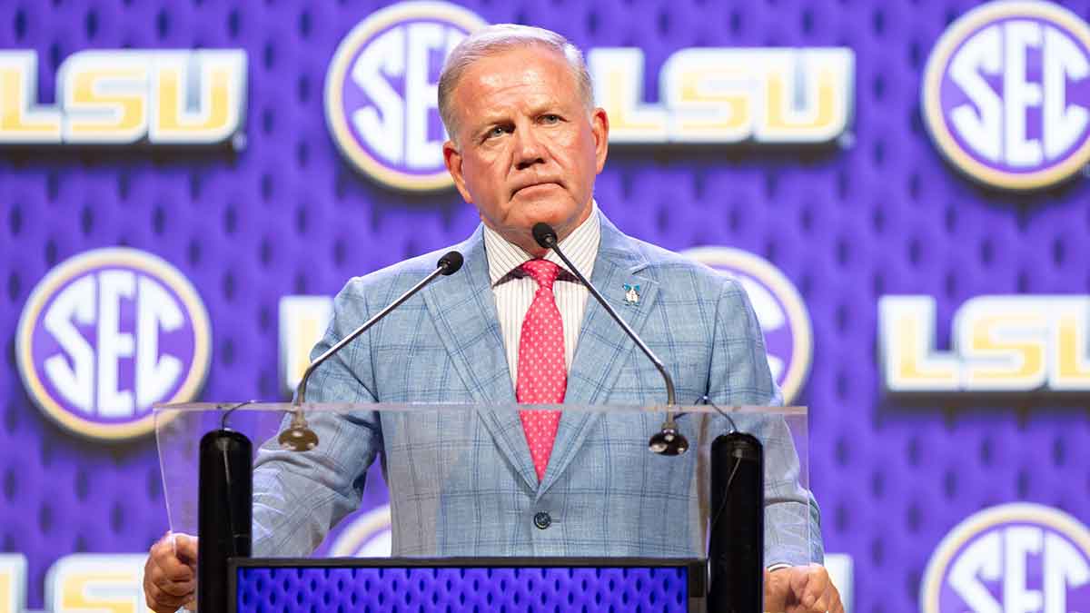 LSU head coach Brian Kelly speaking at Omni Dallas Hotel.