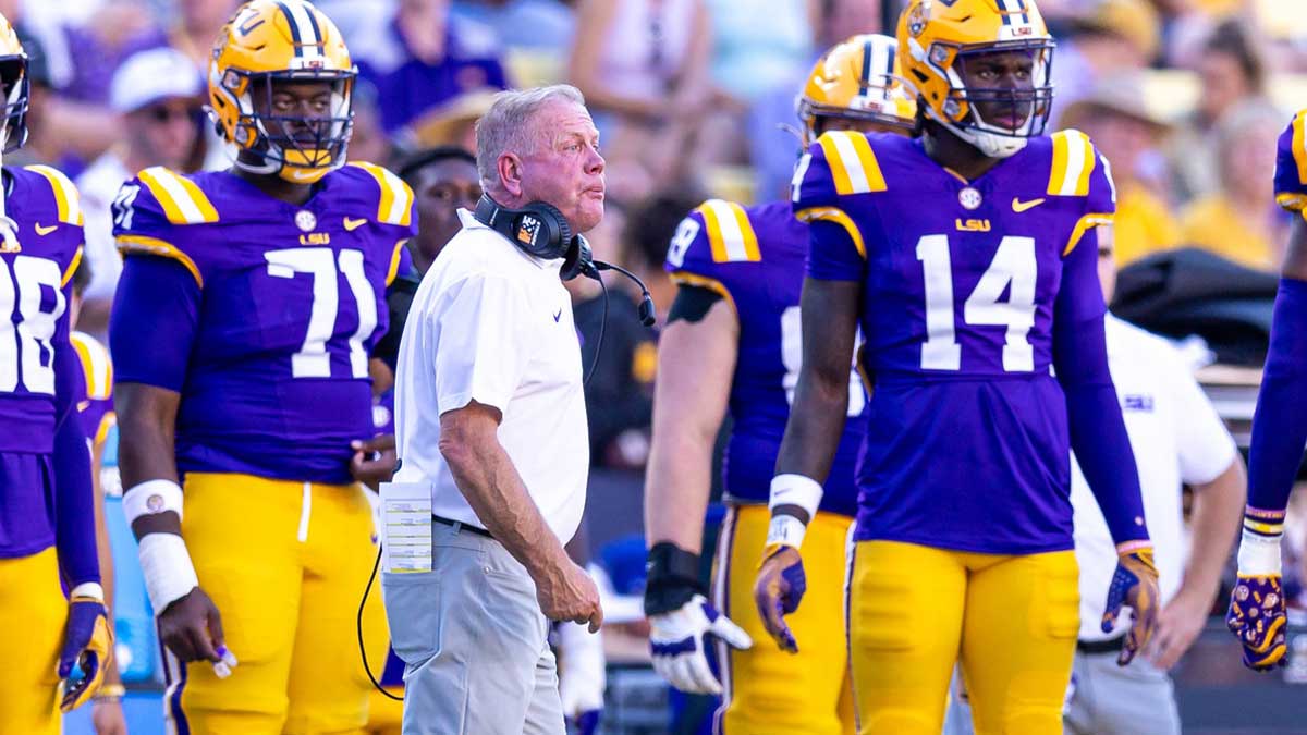Sep 21, 2024; Baton Rouge, Louisiana, USA; LSU Tigers head coach Brian Kelly yells to quarterback Garrett Nussmeier (13) during the second half against the UCLA Bruins at Tiger Stadium. Mandatory Credit: Stephen Lew-Imagn Images