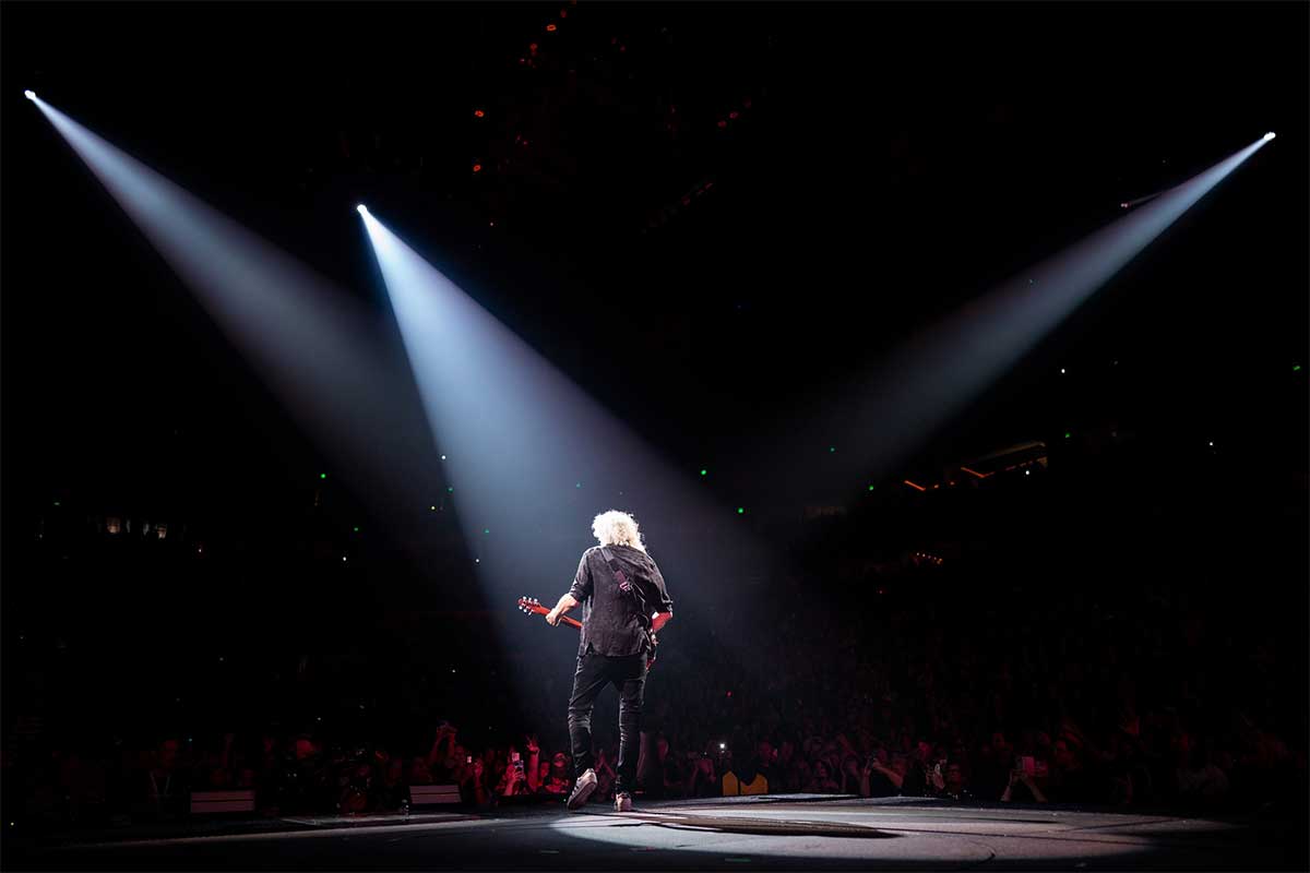 Brian May of Queen + Adam Lamber performing on the Rhapsody Tour in 2023.