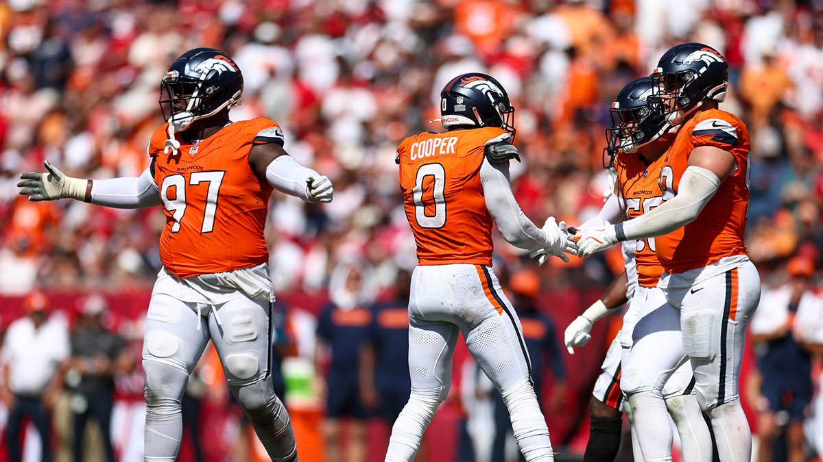 Denver Broncos linebacker Jonathon Cooper (0) celebrates after a sack against the Tampa Bay Buccaneers in the fourth quarter at Raymond James Stadium.