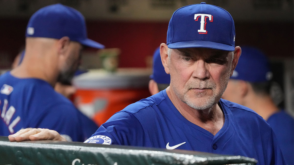 Texas Rangers manager Bruce Bochy (15) watches game action against the Arizona Diamondbacks in the first inning at Chase Field.