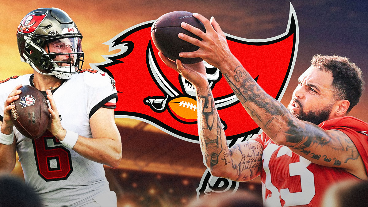 Tampa Bay Buccaneers logo in center, Tampa Bay Buccaneers quarterback Baker Mayfield throwing the football on left hand side, Tampa Bay Buccaneers wide receiver Mike Evans catching the football on right hand side, Raymond James Stadium (home stadium of the Buccaneers) in background