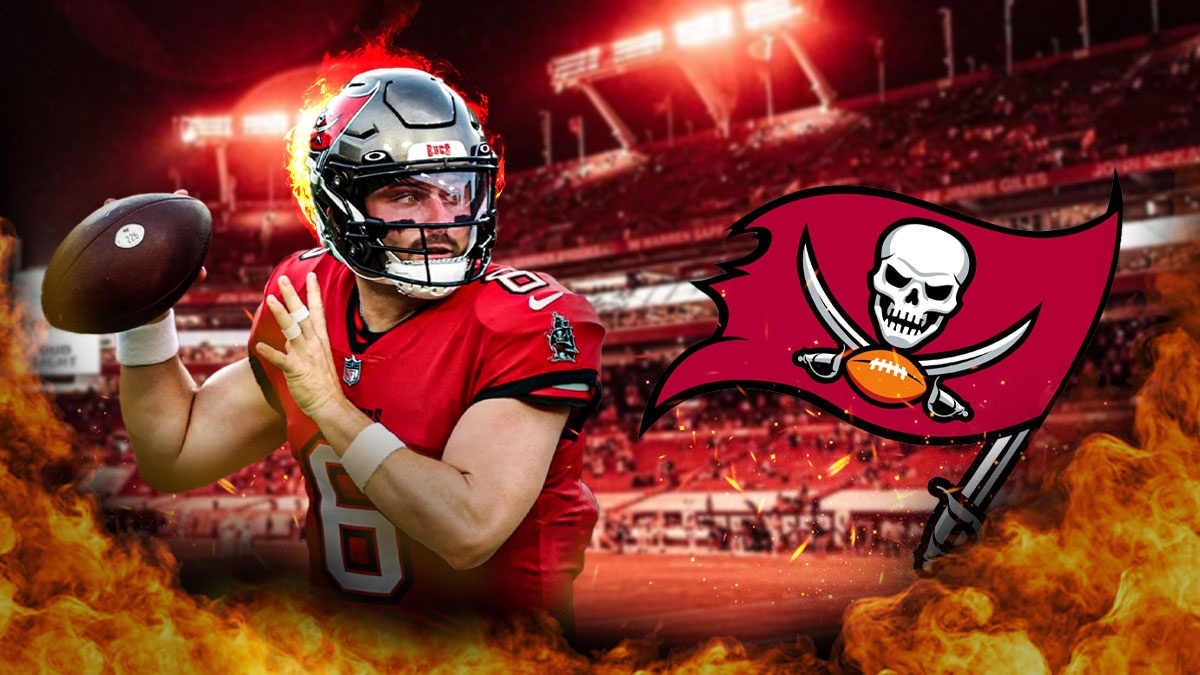 Buccaneers' Baker Mayfield with his helmet on fire and surrounded by fire at Raymond James Stadium