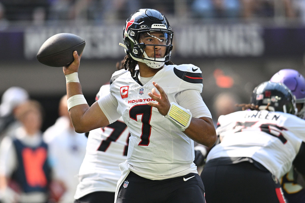 Houston Texans quarterback C.J. Stroud (7) throws a pass against the Minnesota Vikings during the second quarter at U.S. Bank Stadium.