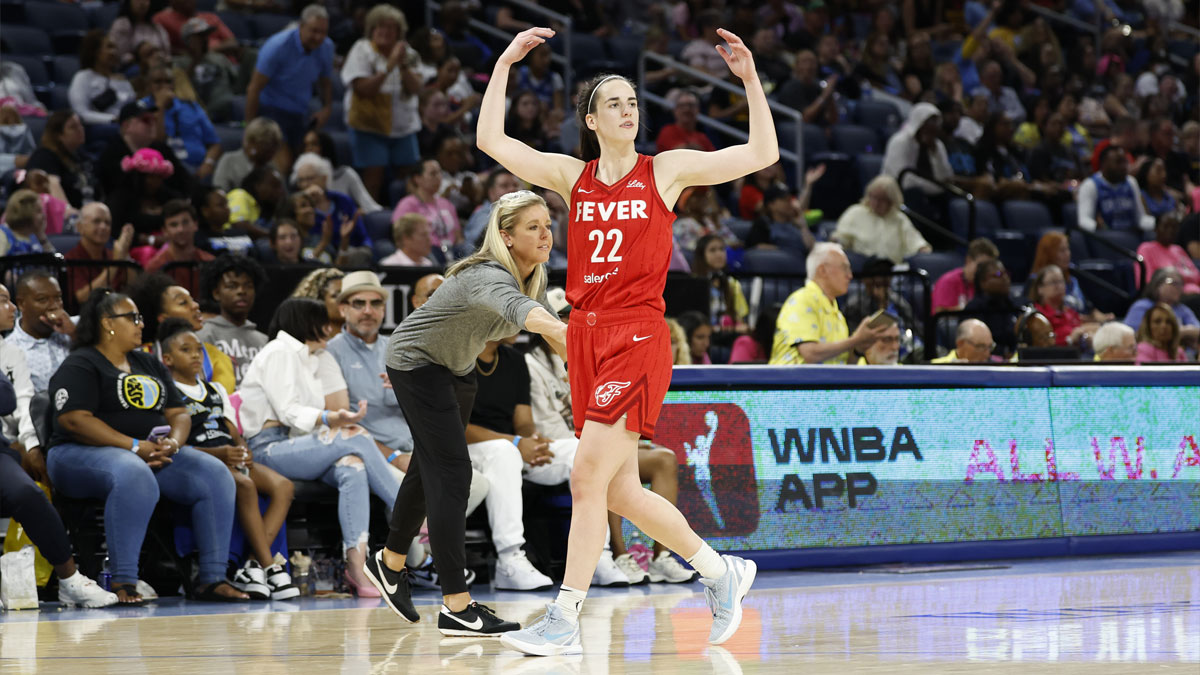 Indiana Fever guard Caitlin Clark (22) reacts as she walks off the floor during the second half of a basketball game against the Chicago Sky at Wintrust Arena.