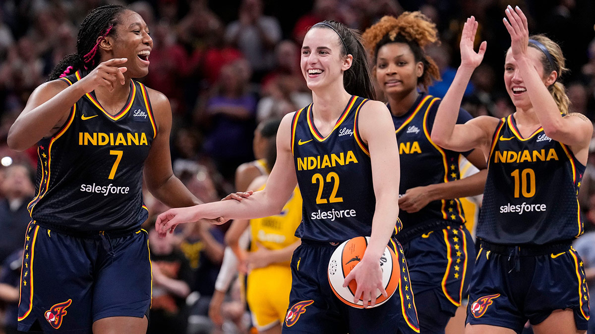 Indiana Fever forward Aliyah Boston (7) celebrates with Indiana Fever guard Caitlin Clark (22) altering recording a triple-double Wednesday, Sept. 4, 2024, during the game at Gainbridge Fieldhouse in Indianapolis. The Indiana Fever defeated the Los Angeles Sparks, 93-86.