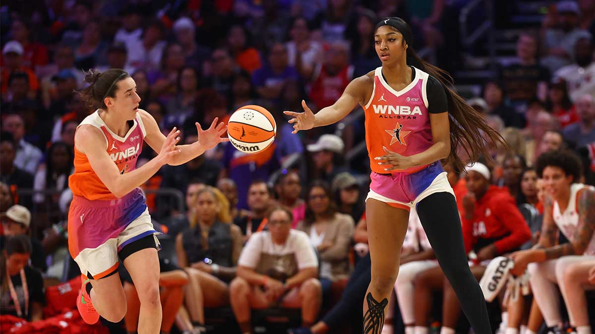 Jul 20, 2024; Phoenix, AZ, USA; Team WNBA guard Caitlin Clark (left) and Angel Reese against the USA Women's National Team during the 2024 WNBA All Star Game at Footprint Center. Mandatory Credit: Mark J. Rebilas-Imagn Images