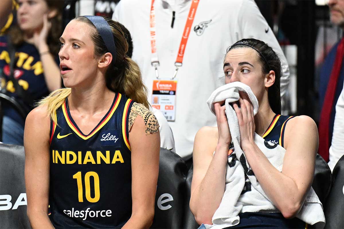 Indiana Fever guard Lexie Hull (10) and Indiana Fever guard Caitlin Clark (22) watch from the bench in the fourth quarter during game one of the first round of the 2024 WNBA Playoffs at Mohegan Sun Arena