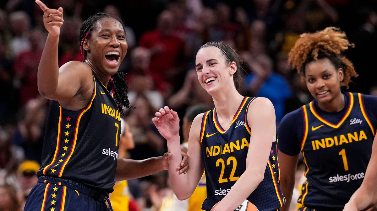 Indiana Fever forward Aliyah Boston (7) celebrates with Indiana Fever guard Caitlin Clark