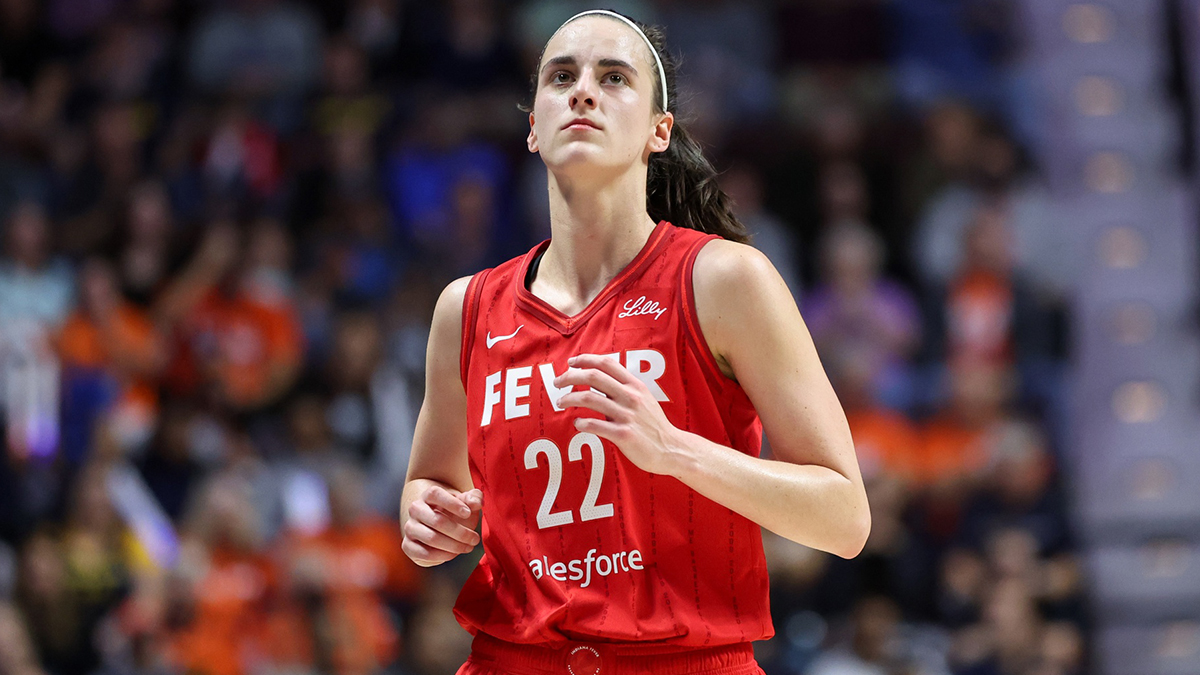 Sep 25, 2024; Uncasville, Connecticut, USA; Indiana Fever guard Caitlin Clark (22) reacts during the first half against the Connecticut Sun during game two of the first round of the 2024 WNBA Playoffs at Mohegan Sun Arena. Mandatory Credit: Paul Rutherford-Imagn Images