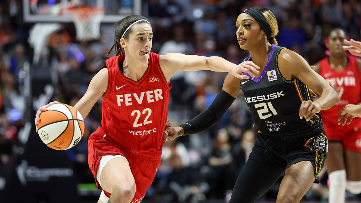 Indiana Fever guard Caitlin Clark (22) drives to the basket defended by Connecticut Sun guard DiJonai Carrington (21) during the first half during game two of the first round of the 2024 WNBA Playoffs at Mohegan Sun Arena. 