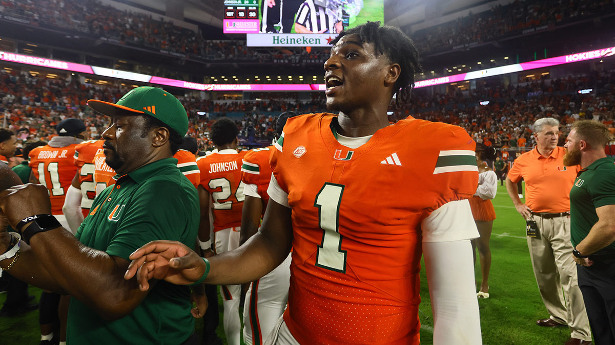 Miami Hurricanes quarterback Cam Ward (1) looks on from the field as officials review the last play of the game against the Virginia Tech Hokies at Hard Rock Stadium.