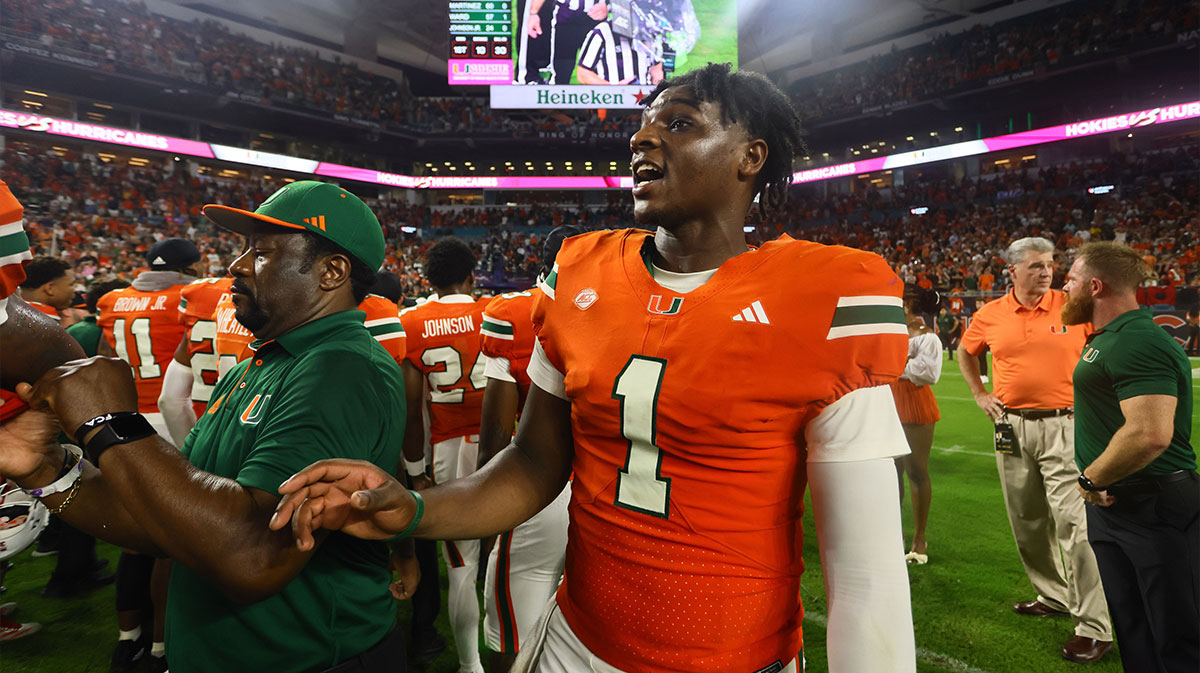 Miami Hurricanes quarterback Cam Ward (1) looks on from the field as officials review the last play of the game against the Virginia Tech Hokies at Hard Rock Stadium.