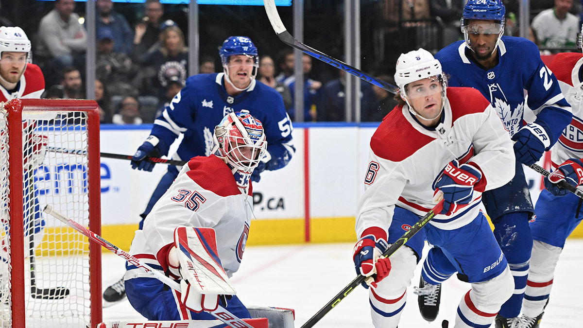 Canadiens defenseman Chris Wideman (6) moves to clear the puck after a save by goalie Sam Montembeault (35) against the Toronto Maple Leafs in the third period at Scotiabank Arena