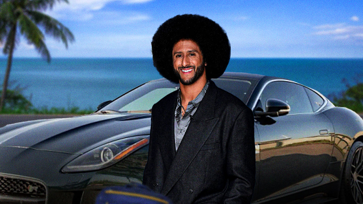 Colin Kaepernick in front of a car from his collection.