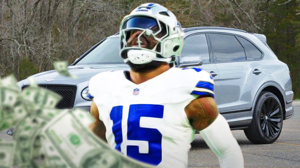 Ezekiel Elliott in front of a car from his collection.