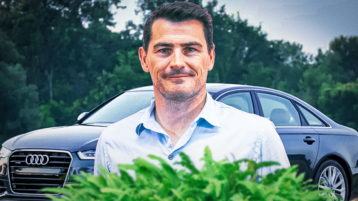 Iker Casillas in front of a car from his collection.