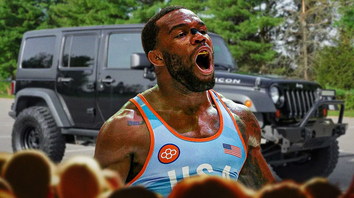 Jordan Burroughs in front of a car from his collection.