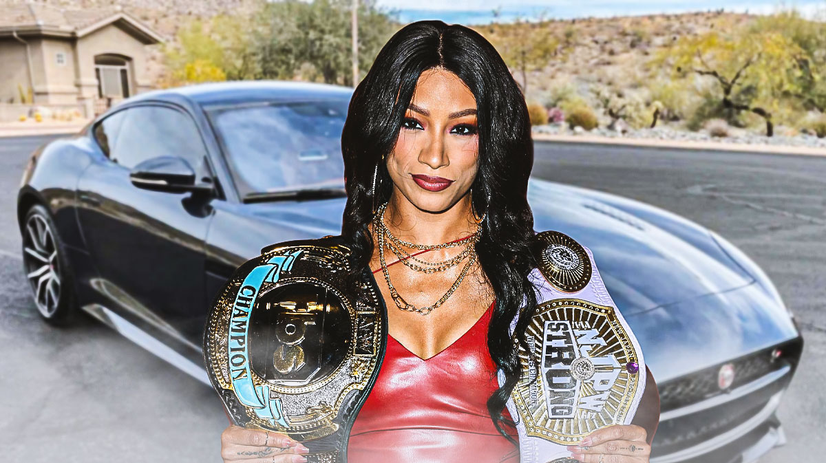 Mercedes Moné in front of a car from her collection.