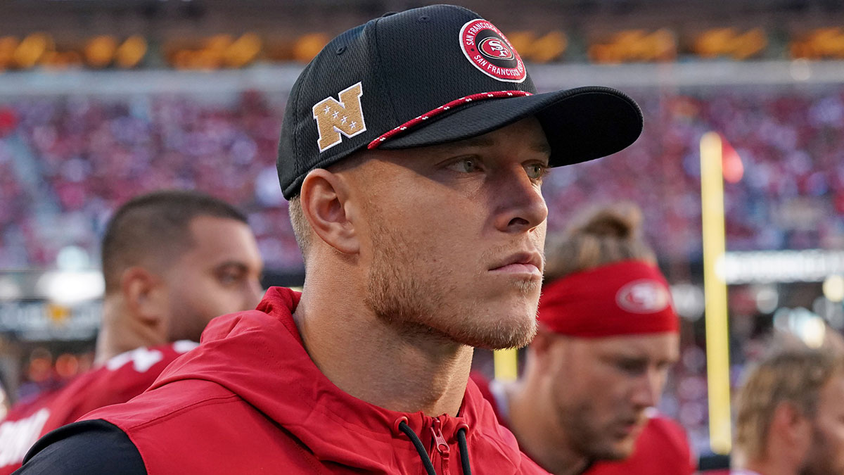 San Francisco 49ers running back Christian McCaffrey (23) watches injured from the sidelines in the second quarter against the New York Jets at Levi's Stadium.