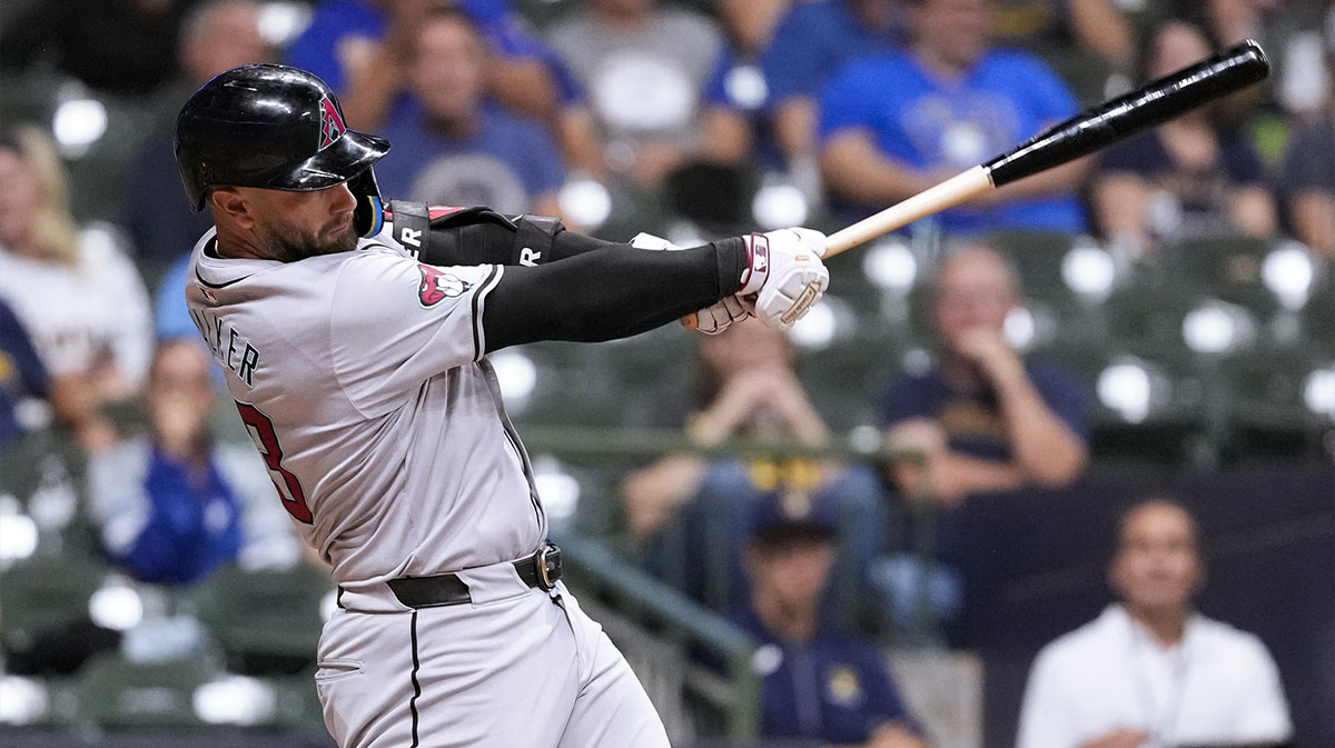 Arizona Diamondbacks first baseman Christian Walker (53) hits a sacrifice fly ball during the fifth inning against the Milwaukee Brewers at American Family Field.