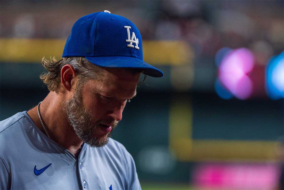 Los Angeles Dodgers pitcher Clayton Kershaw (22) reacts after pitching change in the second inning during a game against the Arizona Diamondbacks at Chase Field.