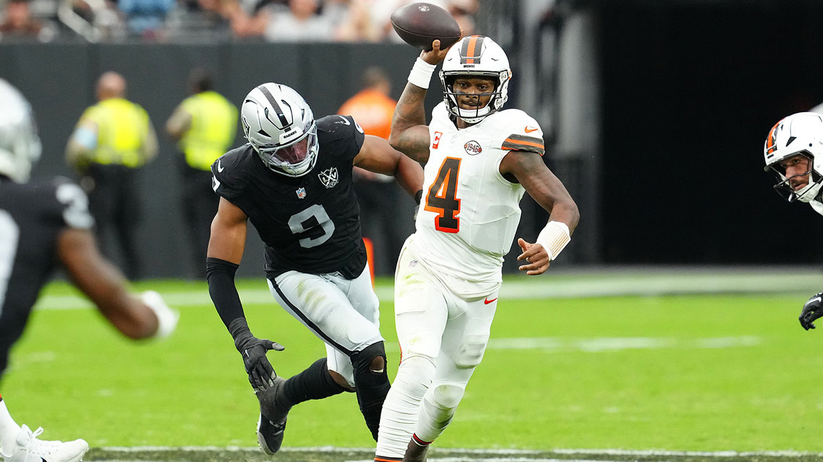 Cleveland Browns quarterback Deshaun Watson (4) throws under pressure against Las Vegas Raiders defensive end Tyree Wilson (9) during the second quarter at Allegiant Stadium.