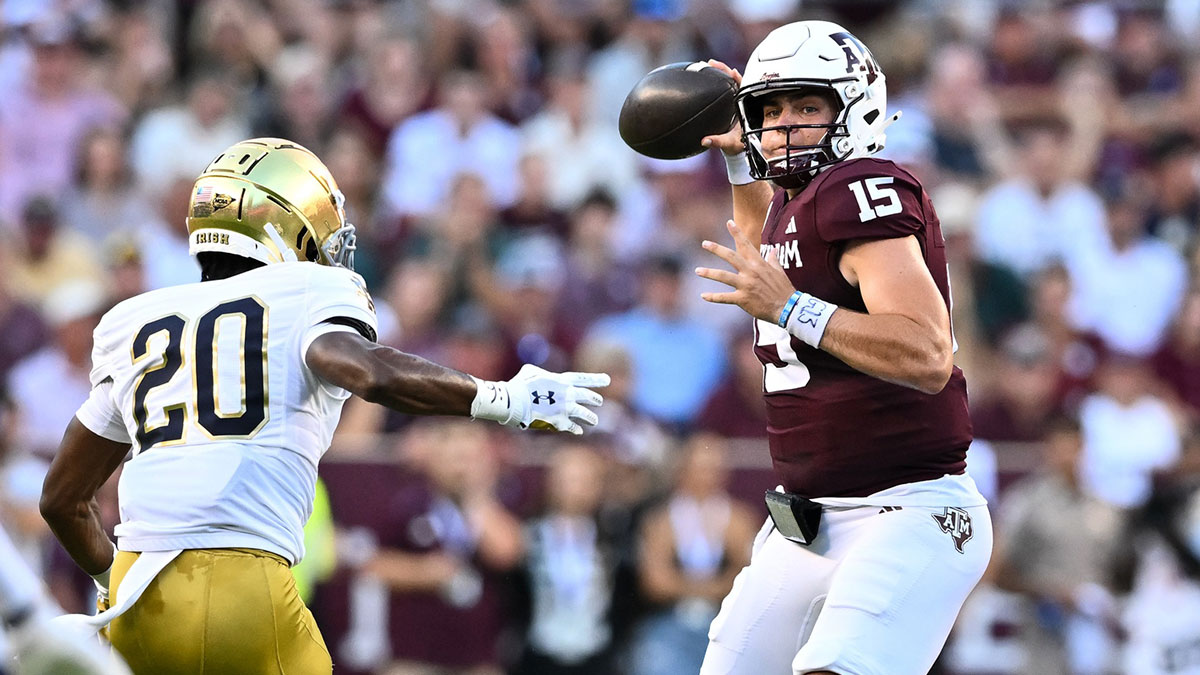Texas A&M Aggies quarterback Conner Weigman (15) looks to pass the ball during the first half against the Notre Dame Fighting Irish at Kyle Field