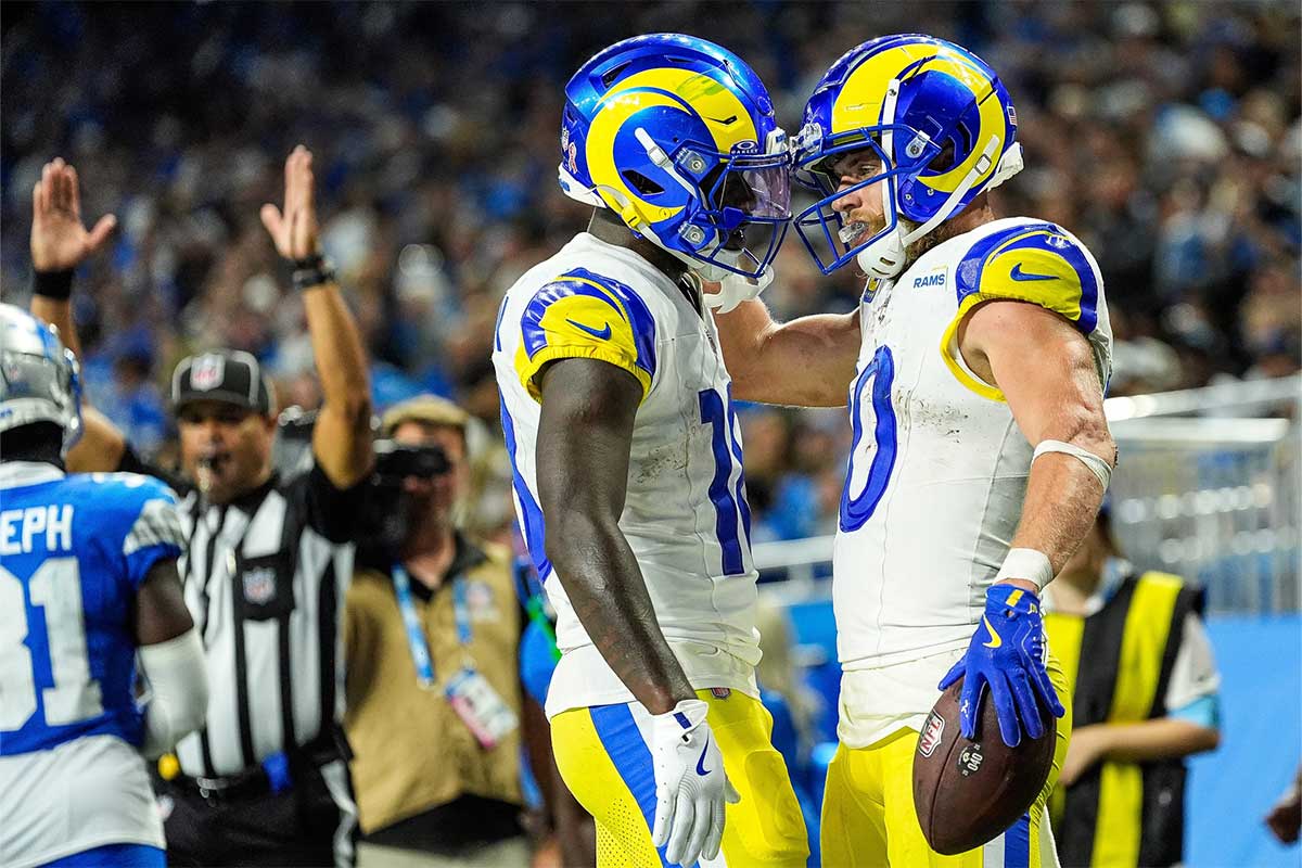 Los Angeles Rams wide receiver Cooper Kupp (10) celebrates a touchdown against with wide receiver Tyler Johnson (18) during the second half at Ford Field in Detroit on Sunday, September 8, 2024.