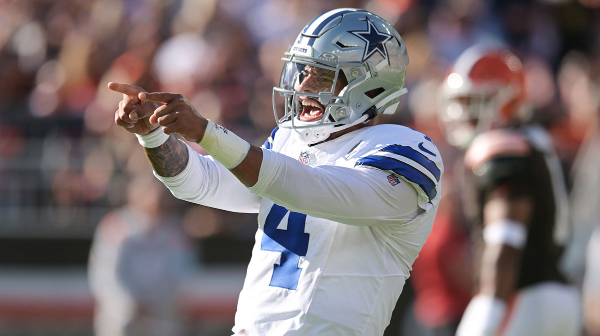 Dallas Cowboys quarterback Dak Prescott (4) celebrates after a touchdown during the first half against the Cleveland Browns at Huntington Bank Field.
